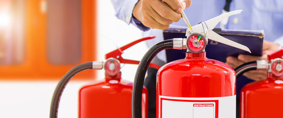 Fire extinguisher, Engineer inspection and checking pressure gauge level of fire extinguisher tank...