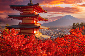 Japan pagoda. Mount Fuji in Japan. Pagoda near Fujiyama volcano. Japan in autumn day. Landscape with red Japanese maple. Nature Japanese. Red maple tree in front of Mount Fuji. Fujikawaguchiko - obrazy, fototapety, plakaty