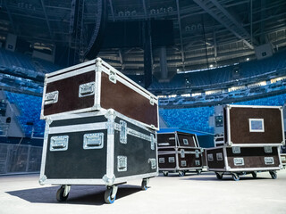 Musical equipment. Cases on wheels for musical equipment. Black cases with sound equipment. Concert...