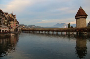 Fototapeta premium Chapel Bridge (The Kapellbrücke) in the river Reuss Lucerne, Switzerland 
