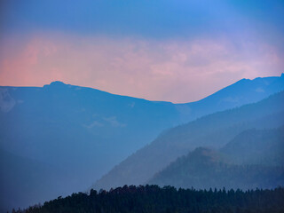 Layers at sunset in light rain in the Rocky Mountains
