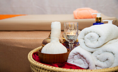 Spa Thai setting for aroma therapy and sugar and salt massage with flower on the bed, relax and healthy care. Healthy Concept