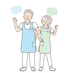 腕を組んで笑顔のシニア医療従事者