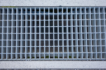 drainage ditch on the sidewalk of main road in gunma prefecture, japan