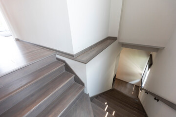White Modern wood Staircase interior at home.