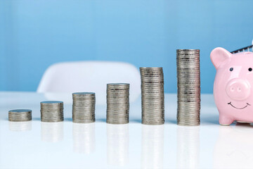 Money stack step up growing growth saving money, Concept financial business investment, Coins stack arranged as a graph.