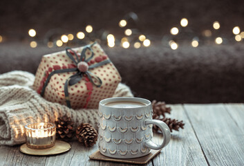 Christmas cozy background with a beautiful cup and decorative details.