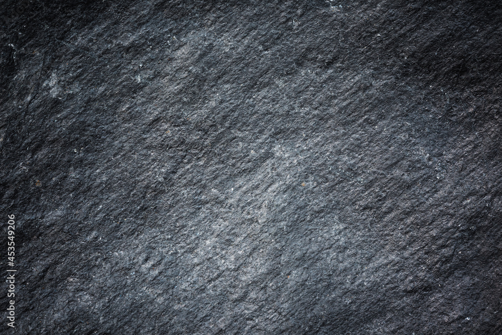 Wall mural patterned structure of black slate background texture for design.