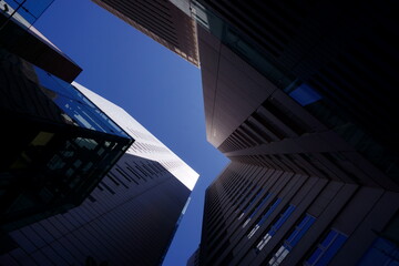 Futuristic tall buildings with blue sky and sunshine1