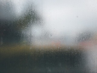 Water drops of rain on window glass