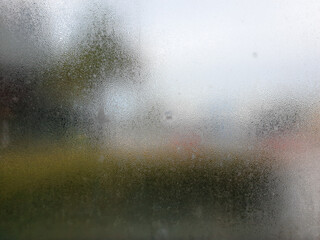 Water drops of rain on window glass