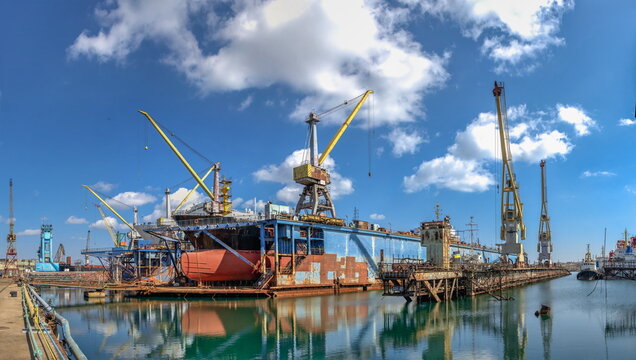 Large ship in dry dock of shipyard