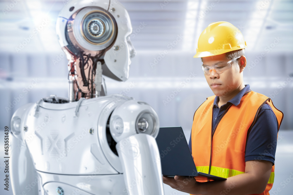 Poster technician or engineer work with robot in factory