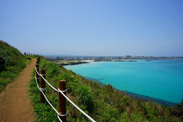 a beautiful seaside landscape with a walkway