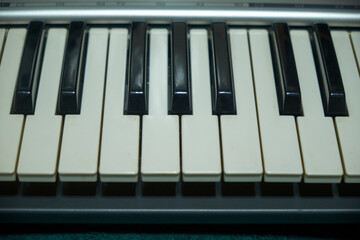 piano keys closeup ,Piano or synthesizer keyboard ,Traditional musical instrument with keyboard and...