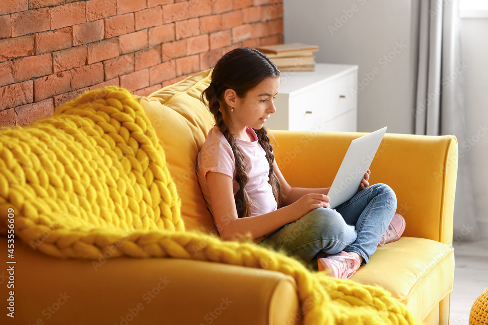 Sticker Cute girl watching cartoons at home