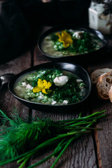 Okroshka in a black plate. Cold soup