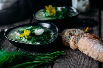 Okroshka in a black plate. Cold soup
