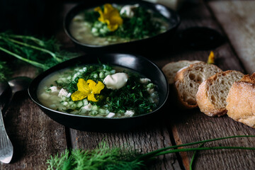 Okroshka in a black plate. Cold soup