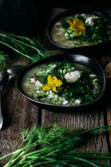 Okroshka in a black plate. Cold soup