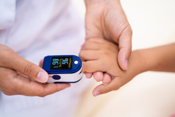 Doctor Checking Child Blood Pulse