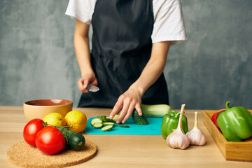 woman lunch at home vegetarian food cutting board