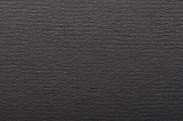 Clean matte dark black paper surface