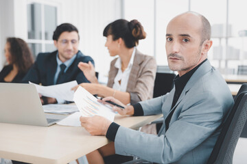 Fototapeta premium Portrait of businesswoman smiling working with diversity business group of people in office, Working woman and collaboration concept