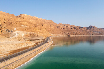 Dead Sea waterfront highway on a beautiful morning, Aerial view.