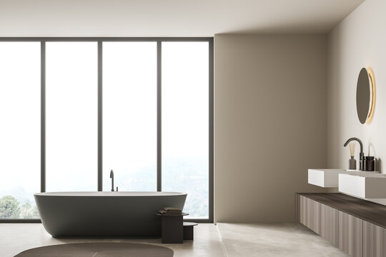 Bright bathroom interior with bathtub, panoramic window, carpet, concrete floor