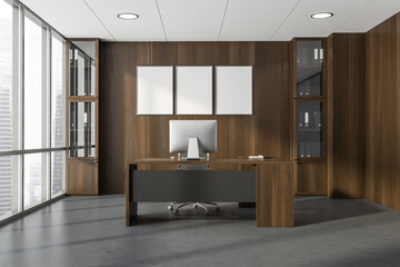 Dark office room interior with three empty posters