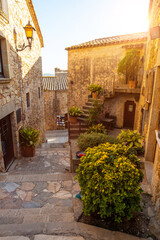 Fototapeta na wymiar Streets of Pals medieval town, streets of the historic center at sunset, Girona on the Costa Brava of Catalonia in the Mediterranean