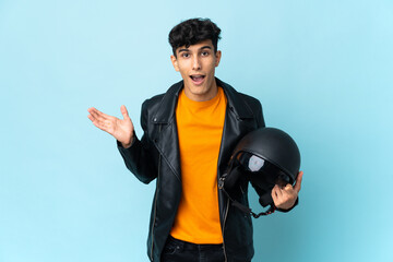 Argentinian man with a motorcycle helmet with surprise facial expression