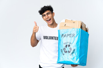 Young man holding a recycling bag full of paper with thumbs up because something good has happened