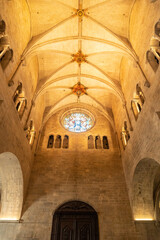Fototapeta premium Girona medieval city, roofs and columns of the interior of the Basilica of San Felix, Costa Brava of Catalonia in the Mediterranean. Spain