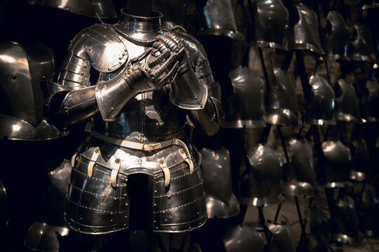 London, UK - 7th June 2017: Suits of armour and a display of breastplates in the Armoury of the Tower of London.