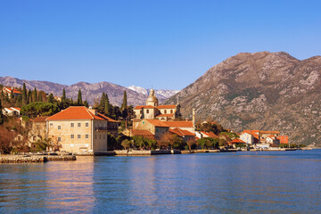 Fototapeta premium Beautiful winter Mediterranean landscape. Montenegro, Adriatic Sea. View of Bay of Kotor and Prcanj town
