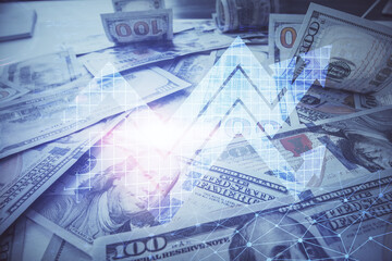 Double exposure of grow arrows drawing over usa dollars bill background. Concept of success.