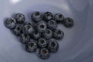 Blueberry in a blue bowl.