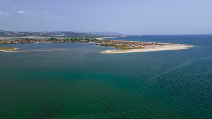 Panoramic drone clip of a small tropical peninsula in Strimonas, Macedonia, North Greece