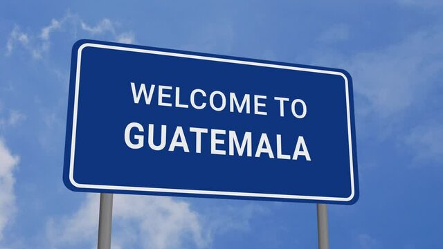 Welcome to Guatemala Road Sign on Clear Blue Sky with Rapid Moving Clouds
