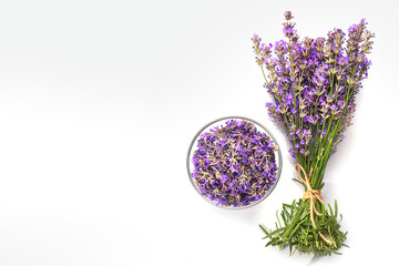 Fresh lavender bunch and lavender flowers in glass bowl. isolated on white background.