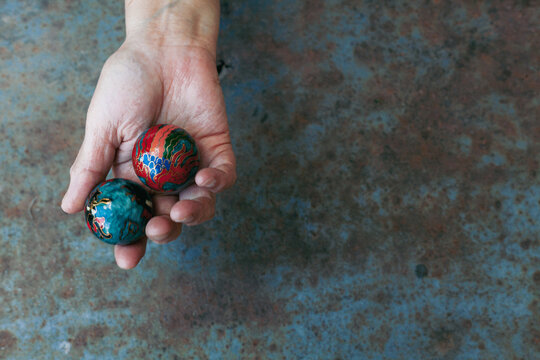 hands of senior adult woman excercising with chinese baoding balls for stress relief and deep relaxation