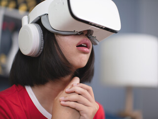 asian girl wearing virtual reality googles at home, remote education experiment, future today, new...
