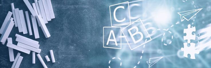 Chalkboard. Crayons for writing on a blackboard. Learning concept. School teaching chalk board.