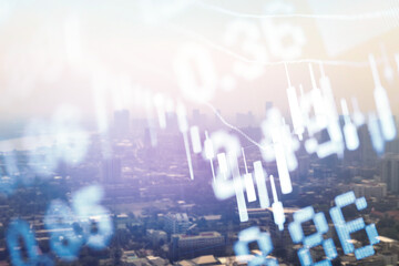 Abstract financial trading graphs and digital number of foreign exchange market trading on monitor. Background of gold and blue digital chart to represent stock market trend.	
