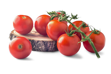 branch of red tomatoes on a wooden board