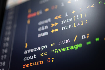 Abstract background of digital binary code of software. Programming software code on computer screen which develop by the programmer to solve the business requirement.