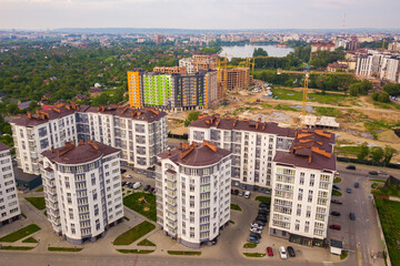 Aerial view of city residential area with high apartment buildings.
