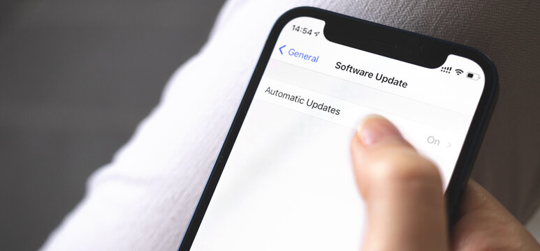 Software Update Screen On Mobile Phone Close-up, Automatic Update Button, Banner Photo